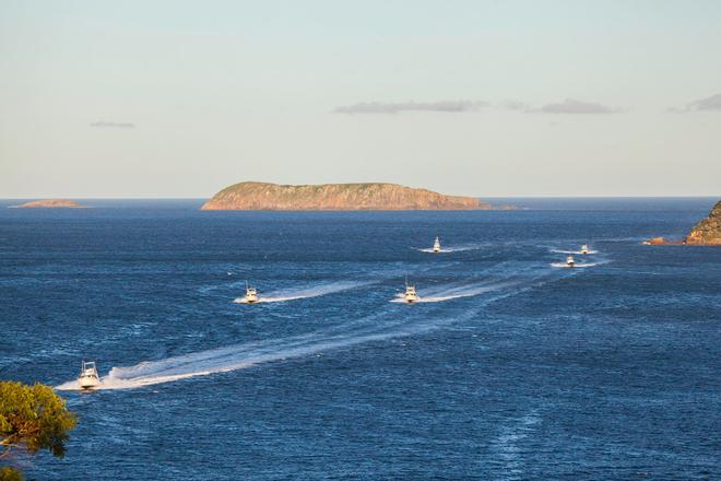 Part of the fleet returning home as the sun sets low and casts a glorious hue over Boondelbah Island. - 2016 NSWGFA Interclub Championship ©  John Curnow