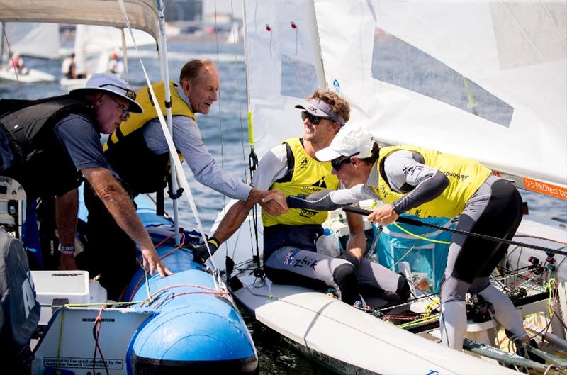 Men's 470 coach Victor Kovalenko, Mat Belcher and Will Ryan - Hempel World Cup Series Enoshima, day 6 photo copyright Pedro Martinez / Sailing Energy / World Sailing taken at  and featuring the 470 class