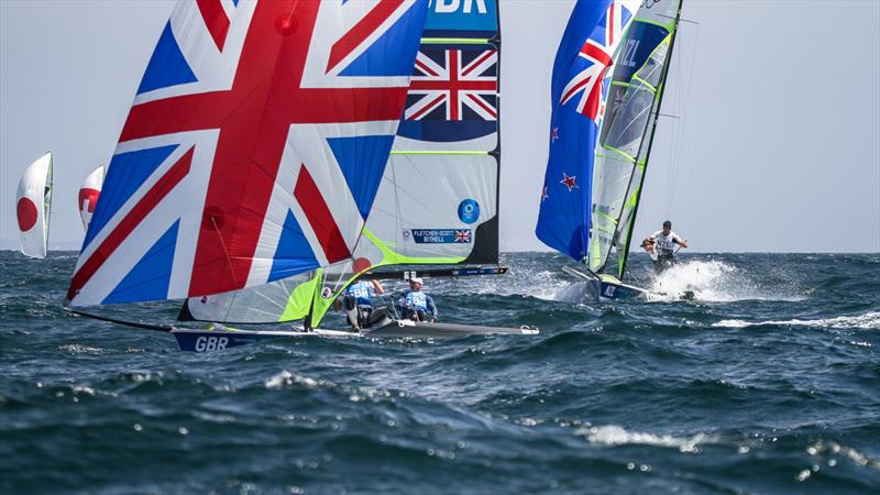 Tokyo2020 - Day 4 - July, 28, - Enoshima, Japan. Peter Burling and Blair Tuke chasing Dylan Fletcher and Stuart Bithell (GBR) photo copyright Richard Gladwell - Sail-World.com / nz taken at  and featuring the 49er class