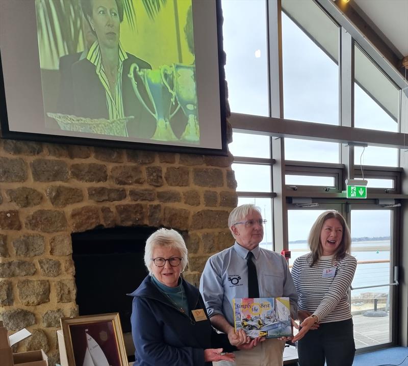 Belinda Cook (l) and Leonie Austin (r) accepting a copy on behalf of the host club, this will be a useful reference work in their archives. Above, the Princess Royal looks on, like her great great-great grandma, she is not amused! photo copyright Sue Tulloch taken at Hayling Island Sailing Club and featuring the 505 class