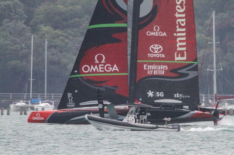 5. Spy boat blocks view as Te Aihe's transom appears well clear of the water reducing stern section drag  - Phases of Foiling - December 2019 - photo © Richard Gladwell / Sail-World.com