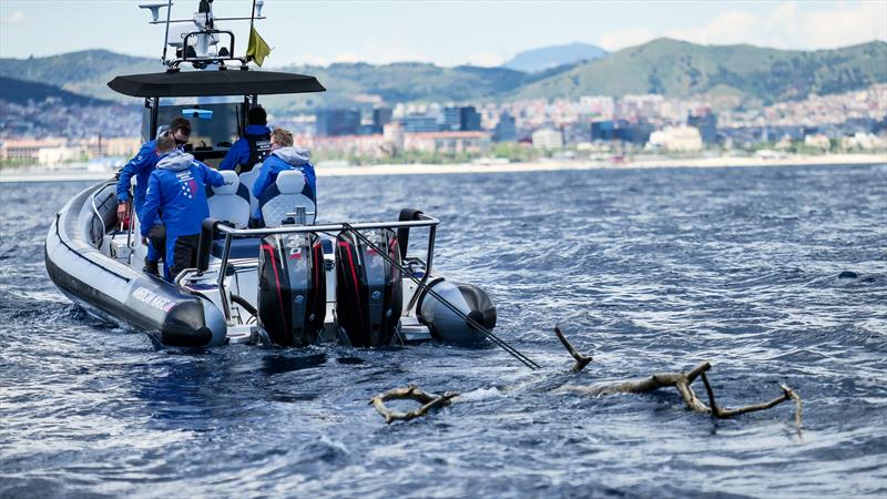 American Magic - towing some debris - AC75 - Day 9 - May 20, 2024 - Barcelona - photo © Alex Carabi / America's Cup
