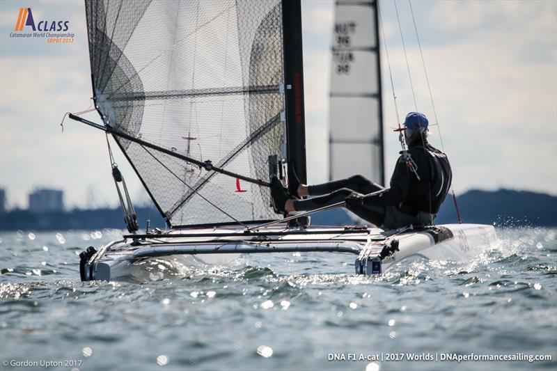 Former World Champion, Scott Anderson takes it easy downwind on A Class Cat Worlds day 4 photo copyright Gordon Upton taken at Sopot Sailing Club and featuring the A Class Catamaran class
