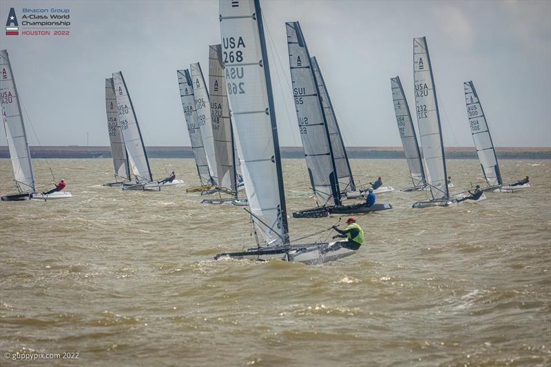 Race 2 gets away clean on day 3 of the Beacon Group A-Class Catamaran World Championships in Texas photo copyright Gordon Upton / www.guppypix.com taken at Houston Yacht Club and featuring the A Class Catamaran class