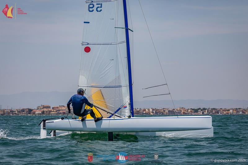 A Class Catamaran Europeans Day 1 - Alberto Farnessi SWE, rounds the first park in pole on his beloved Marstrom M5 Classic - photo © Gordon Upton / www.guppypix.com