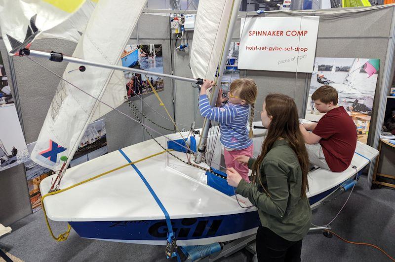 Cadet class spinnaker competition on the simulator at the RYA Dinghy & Watersports Show 2022 photo copyright Mark Jardine / YachtsandYachting.com taken at RYA Dinghy Show and featuring the Cadet class