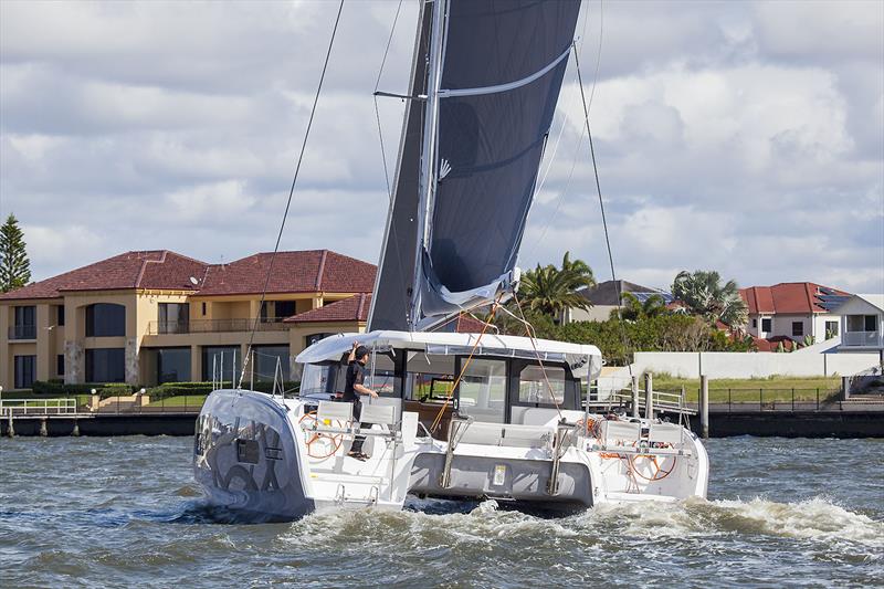 Micah Lane demonstrates the 'run' from helm to helm. Excess 11 - photo © John Curnow