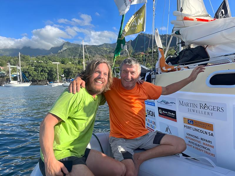 First into Hiva Oa island Tahuaku Bay Renaud Stitelmann (#28 CAPUCINETTE / CH ) greets Aussie Dan Turner on IMMORTAL GAME just 15 hours behind him after 4300 miles!! and leg 2 has another 2700 miles to go before we have a winner! - photo © Frieda Fennell