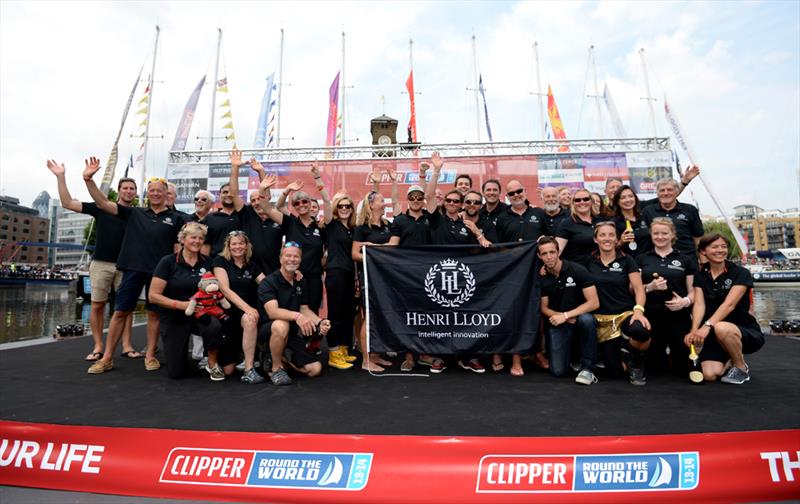 Members of the Henri Lloyd team celebrate winning the overall race on the podium after the Clipper Round the World Race Finish in London photo copyright EMPICS Sport taken at  and featuring the Clipper Ventures class