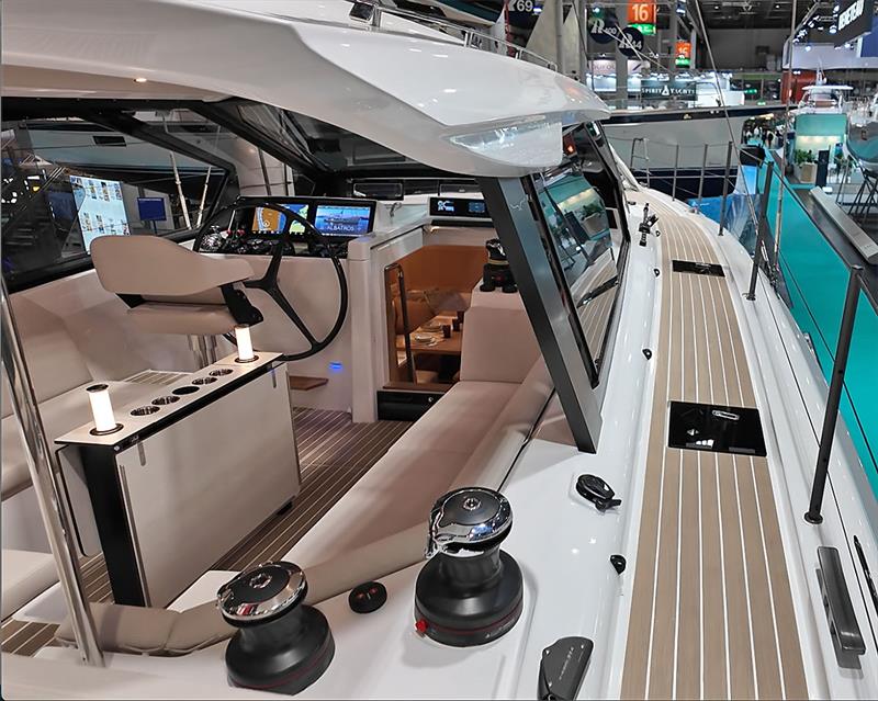 Spacious and light centre cockpit, sleek pilothouse roof, and moulded in 'timber' decking - Wauquiez 55 - photo © Mark Jardine