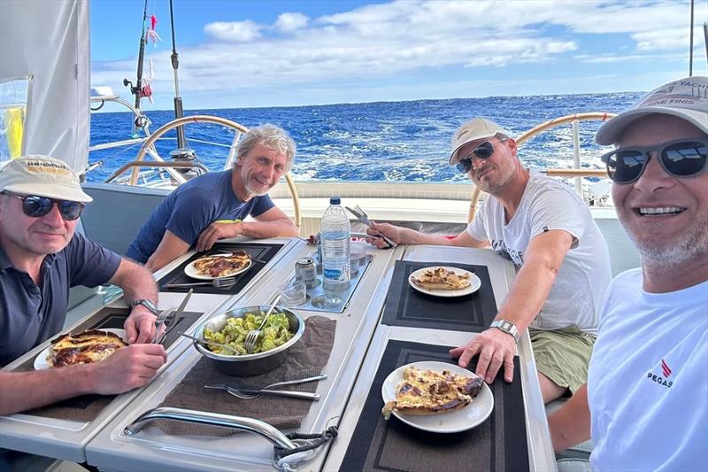 Pegasus 50 Sine Finis crew enjoying a meal - photo © Pegasus Yachts