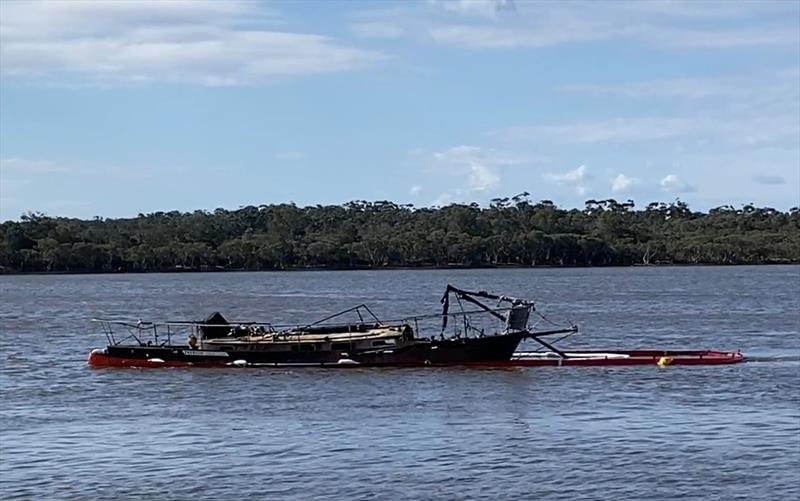 Booms were placed around the vessel - photo © Marine Rescue NSW