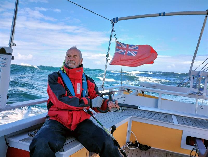 Pete Hill steering Kokachin in a gale, 2022 - photo © Linda Crew-Gee