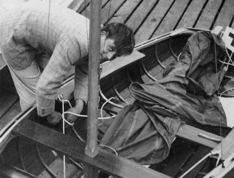 A young Charles Currey working on a 10ft dinghy of his own design photo copyright Currey Family taken at  and featuring the Classic & Vintage Dinghy class