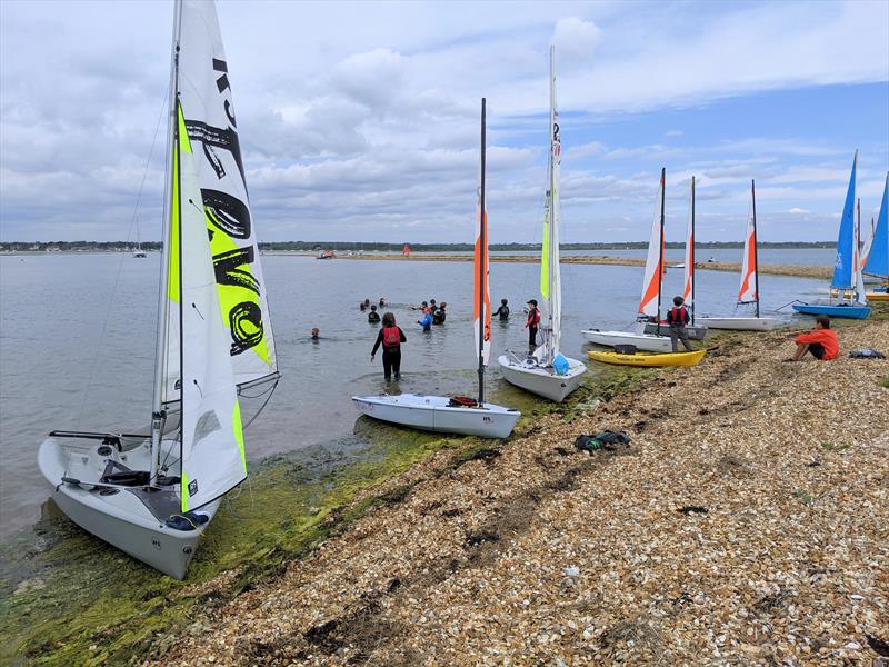 Fun with water pistols for the juniors at Keyhaven photo copyright Mark Jardine taken at Keyhaven Yacht Club and featuring the Dinghy class
