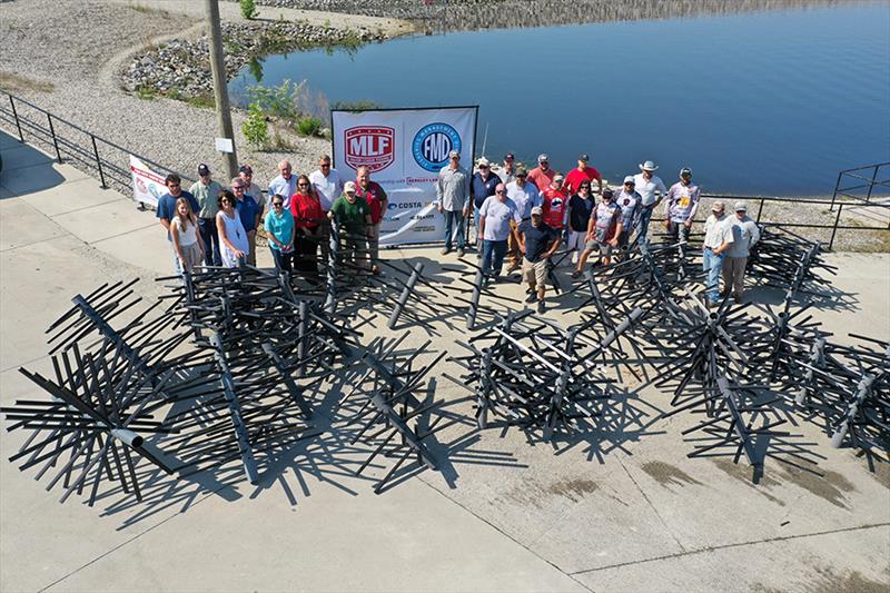 USA volunteers representing Iron Workers Local 92 and United Association Local 91 along with professional anglers and Major League Fishing staff assembled 85 artificial fish habitats photo copyright Union Sportsmen’s Alliance taken at  and featuring the Environment class