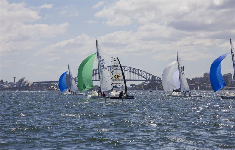 On a busy day the Harbour has all manner of craft out photo copyright John Curnow taken at Royal Sydney Yacht Squadron and featuring the Etchells class