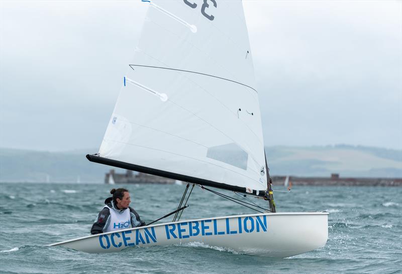 Laura Baldwin carrying an important message on Day 1 at the 2021 UK Europe National Championships - photo © Linus Etchingham