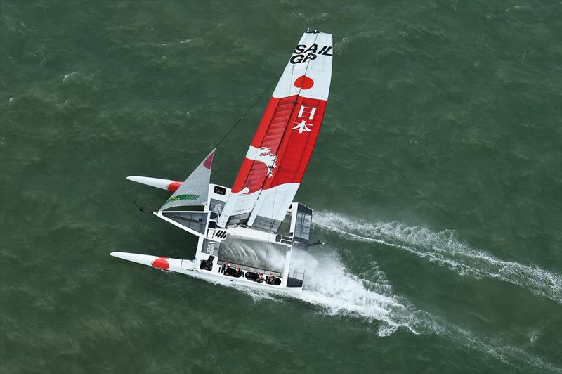 Japan SailGP Team helmed by Nathan Outteridge sail toward the start line of the second race - Cowes, Day 2, August 11, 2019 - photo © Thomas Lovelock for SailGP