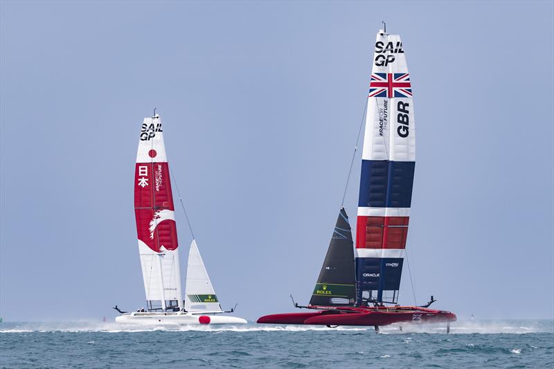 New Zealand SailGP Team helmed by Peter Burling onboard the Great Britain SailGP Team F50 cross paths with Japan SailGP Team helmed by Nathan Outterridge during a practice session ahead of Bermuda SailGP  photo copyright Simon Bruty/SailGP taken at Royal Bermuda Yacht Club and featuring the F50 class