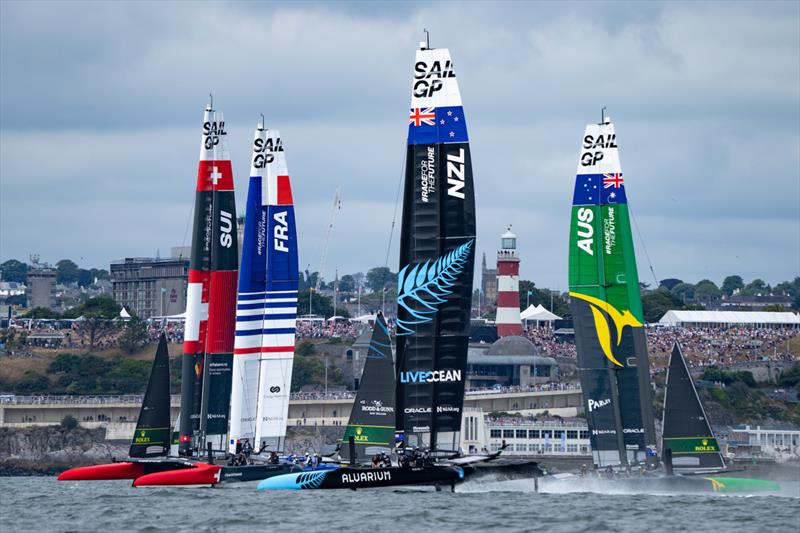 Switzerland SailGP Team Australia SailGP Team, France SailGP Team helmed  and New Zealand SailGP Team  in action on Race Day 1 of the Great Britain Sail Grand Prix | Plymouth in Plymouth, England. 30th July 2022 photo copyright Bob Martin/SailGP taken at Royal Plymouth Corinthian Yacht Club and featuring the F50 class