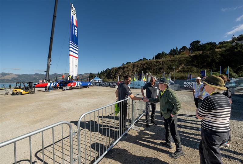 Dave Dobbyn greets Blair Tuke, Co-CEO and wing trimmer of New Zealand SailGP Team, during a tour of the technical area on Race Day 1 of the ITM New Zealand Sail Grand Prix in Christchurch,. March 23, 2024 photo copyright Ricardo Pinto/SailGP taken at Naval Point Club Lyttelton and featuring the F50 class