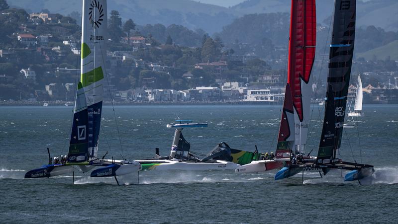 Germany SailGP Team presented by Deutsche Bank, Canada NorthStar SailGP Team and New Zealand SailGP Team sail on as the Australia SailGP Team main wing collapses at the start of the race on Race Day 2 of the Oracle San Francisco Sail Grand Prix - photo © Jason Ludlow for SailGP