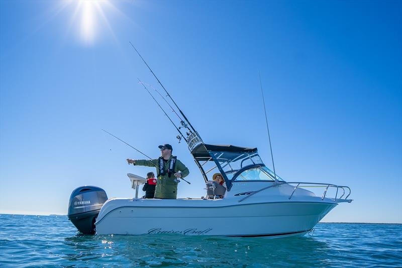 Boating Lifestyle out fishing with the family photo copyright Boating Industry Association taken at  and featuring the Fishing boat class