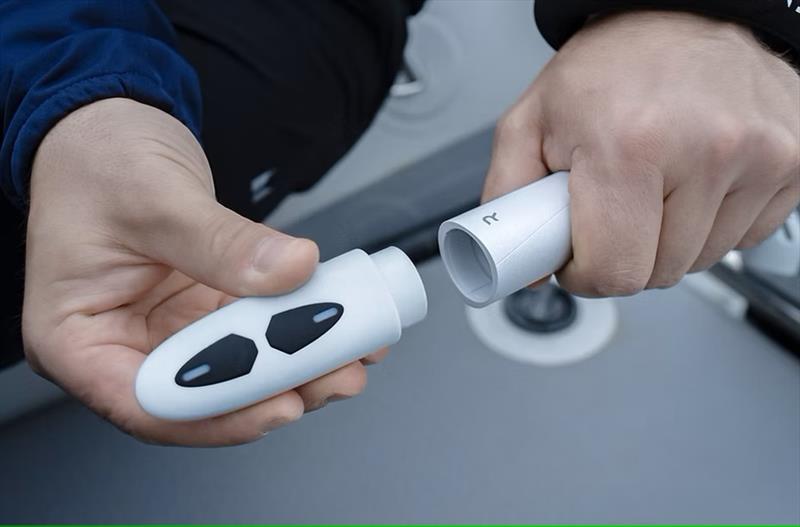 Simple magnetic mount: off the wrist and onto the tiller with a click - photo © Remigo