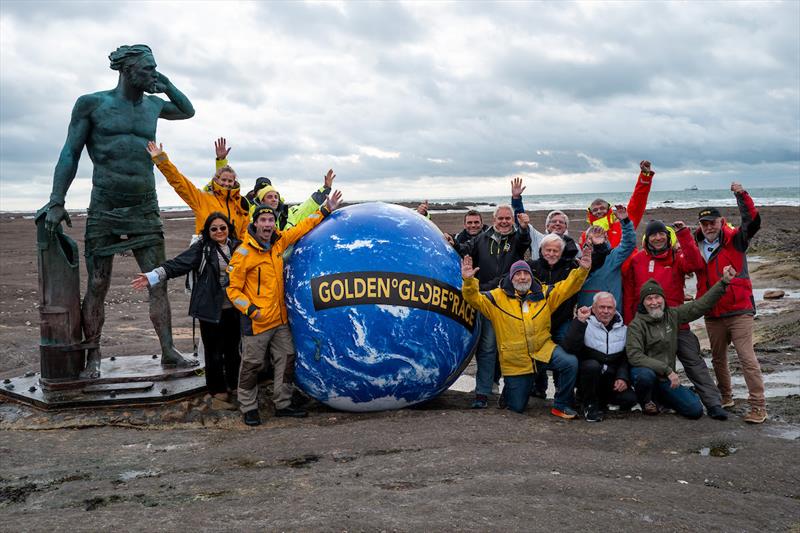 15 out of the 26 Golden Globe Race 2026 skippers and the GGR Team gather on the beach in Les Sables d'Olonne for a special photo with Ulysses, the Greek God that watching over the sea - photo © Rob Havill / GGR 2026