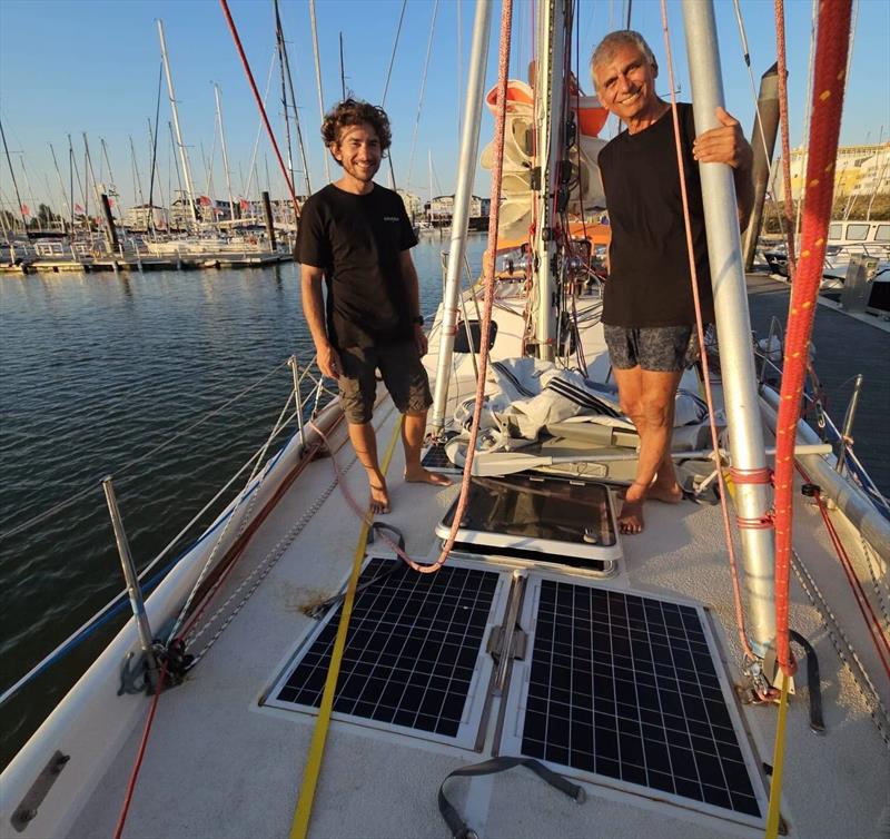 Another dockside story from Les Sables-d'Olonne: Daniel Pinsky (left) visits Turkish skipper Selim Yalcin aboard his Endurance 35 Help Disabled Children. A paediatric orthopaedic surgeon, Selim has devoted much of his life to helping children - photo © Daniel Pinsky / Team Exodus