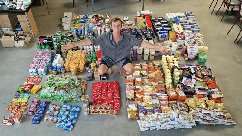 Swiss skipper Étienne Messikommer surrounded by around 250 days' worth of food before it is packed aboard his Tradewind 35 Bernard. Preparing for an anticipated eight months alone at sea means planning every meal before the start of the GGR 2026 - photo © Eloise G. / GGR2026