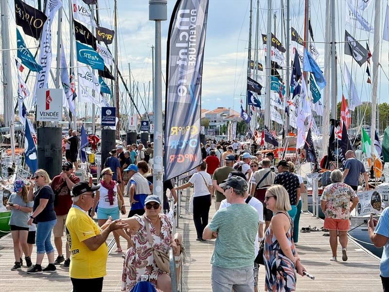 There may be no traditional Race Village this year, but the GGR marina is buzzing with visitors, colourful flags and final preparations. The public can walk among the boats, meet the skippers and experience the excitement as the start approaches - photo © JJ / GGR2026