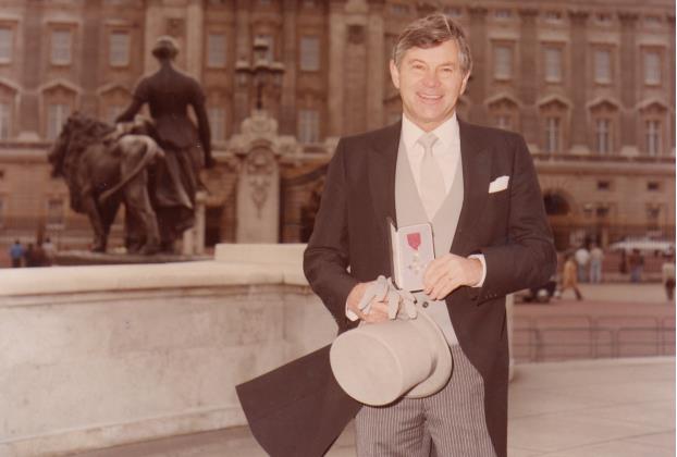 Queen Elizabeth II awards Mr Henri the MBW for his contributions to the clothing industry in 1985 photo copyright Henri-Lloyd taken at  and featuring the  class