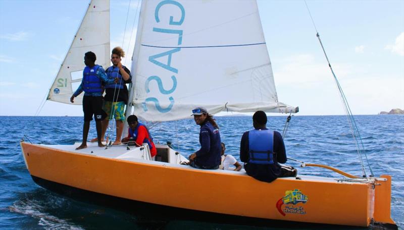 (l-r) Jayden Brown, Elijah Perryman, Terence George, Spencer LeGrande, Kurdy Ambo (behind), and Keondy Garrett on an IC24 - photo © STSC / C. Bareuther