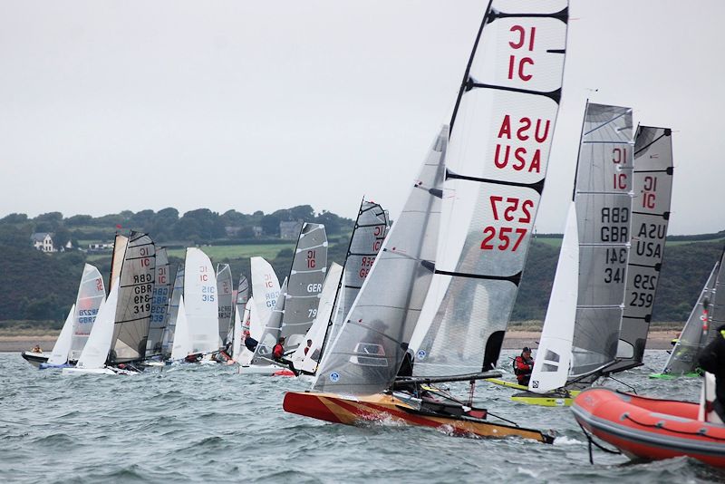 The main IC fleet start Race 4, now able to see where they are going on day 2 of the International Canoe Worlds at Pwllheli photo copyright David Henshall taken at Plas Heli Welsh National Sailing Academy and featuring the International Canoe class