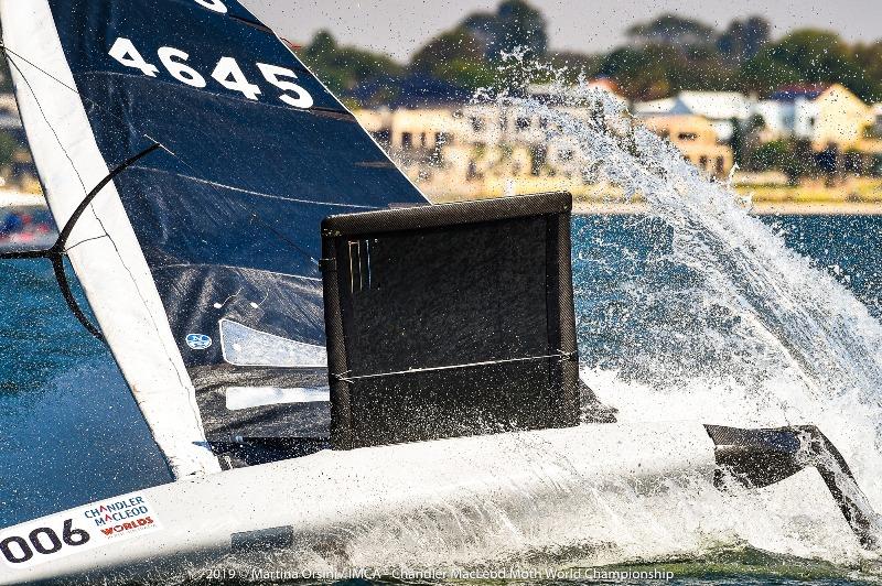 Matt Chew goes for a swim on the first day of finals racing - 2019 Chandler Macleod Moth Worlds photo copyright Martina Orsini taken at Mounts Bay Sailing Club, Australia and featuring the International Moth class