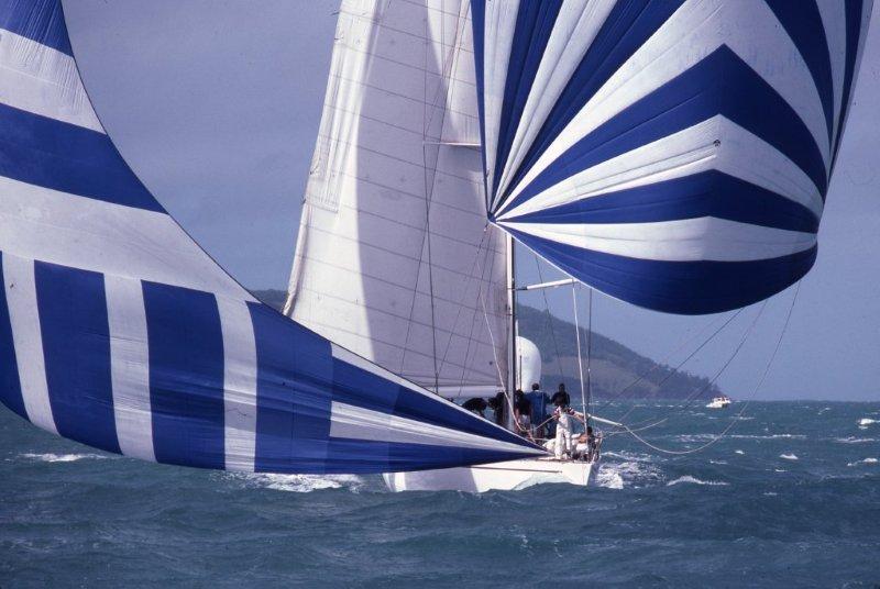 Maxi Ragamuffin - originally Bumblebee IV - sails downwind under spinnaker and blooper at the inaugural Hamilton Island Race Week in 1984. Jim was on board for the 1987 Hobart and 1988 Kenwood Cup - photo © Sandy Peacock