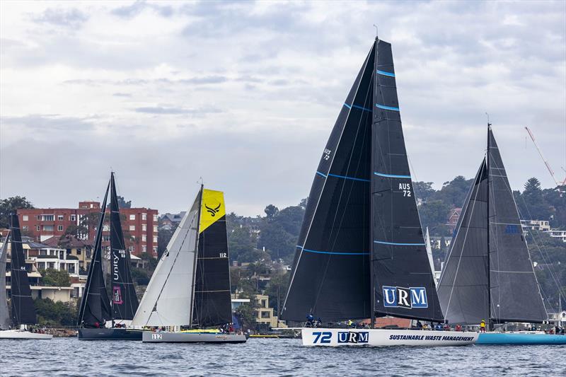 Overall race winner, Voltstar Yeah Baby (with yellow accents in the main) and URM Group leaving Sydney Harbour - photo © CYCA | Andrea Francolini