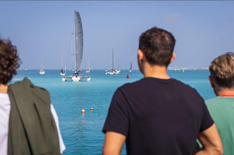 Spectators bid farewell to the fleet from shore - photo © Mikey Brignall / DOSC / DIMC