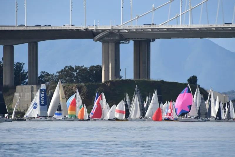 The spinnaker mosh pit under the Bay Bridge photo copyright 2024 Latitude 38 Media LLC / John taken at  and featuring the J Class class