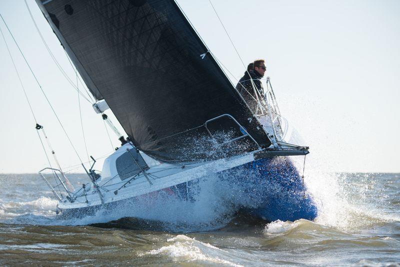 A Jeanneau Sun Fast 3300 hauls the mail uphill in fully crewed mode photo copyright Jeanneau America/Jay Flemming taken at Annapolis Yacht Club and featuring the Jeanneau class