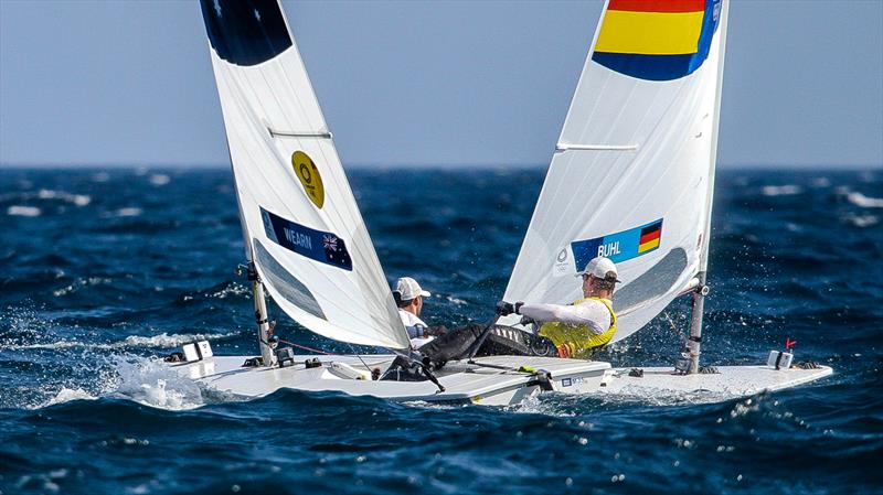 Matt Wearn (AUS) and Philip Buhl (GER) - Mens Laser Medal Race - Tokyo2020 - Day 8- August 1, - Enoshima, Japan photo copyright Richard Gladwell - Sail-World.com/nz taken at  and featuring the ILCA 7 class