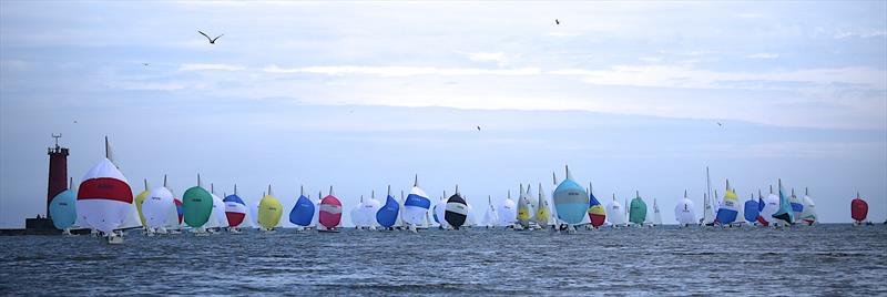 Spinnakers light-up the horizon at the 2014 Lightning North American Championship, hosted by Sail Sheboygan photo copyright Mission Bay Yacht Club taken at  and featuring the Lightning 368 class