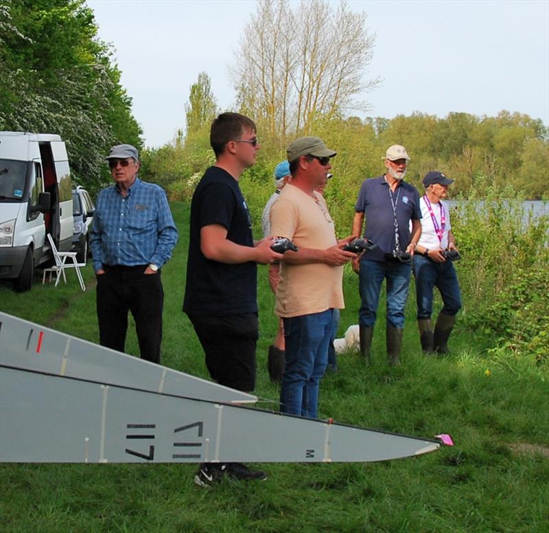 2024 Mermaid Trophy GAMES 4 at Guildford: Young Lewis Wyeth & Rob in deep concentration along with the other skippers whilst RO Alan checks out the maintenance on 117 photo copyright Celia Greetham taken at Guildford Model Yacht Club and featuring the Marblehead class