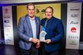 Wes Moxey, Riviera presented with a 2022 Australian Marine Industry Award by Steve Fisher, Rivergate Marina & Shipyard