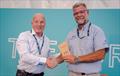 Steve Bruce (right) accepts the Exhibitor Environmental Awards runner up trophy from Mike Golding OBE