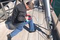 OMS Project Managers hands-on with the hydraulic cylinders