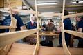 HRH The Princess Royal was given a tour of the Boat Building Academy in Lyme Regis by Director Will Reed (left) and met past and present students