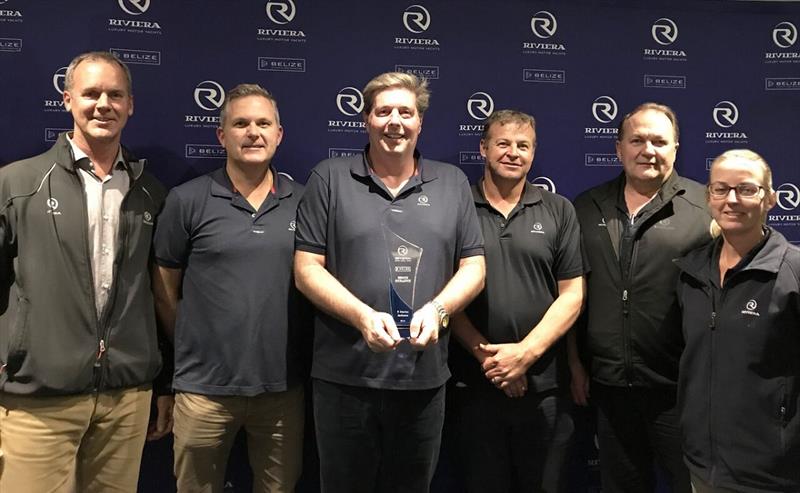 R Marine Jacksons principal Stuart Jackson (centre) accepts the Service Excellence award congratulated by Riviera owner Rodney Longhurst - photo © Riviera Australia